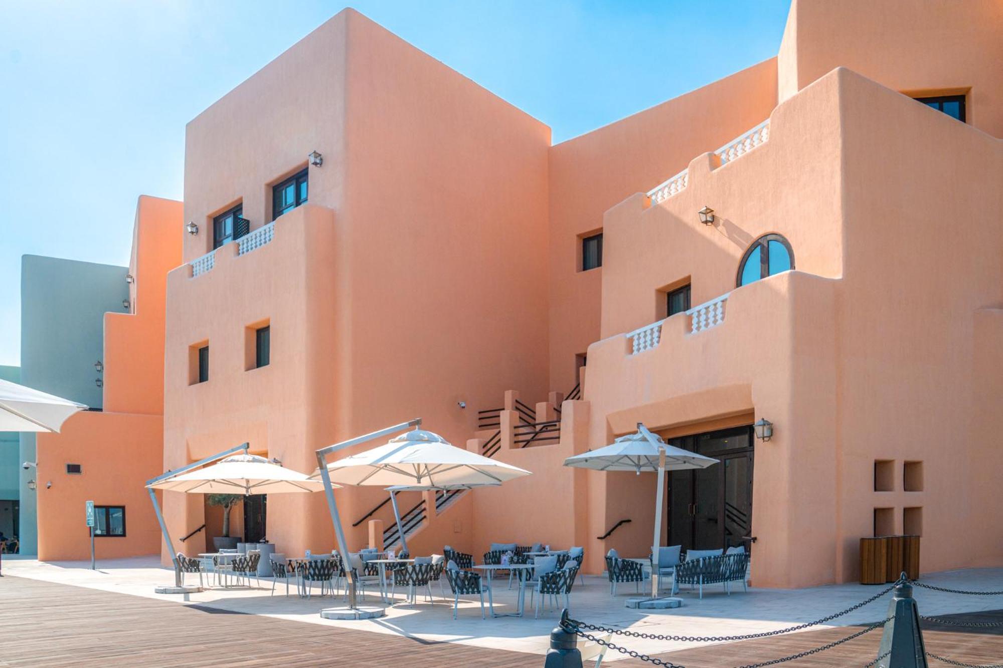 Mina Hotel And Residences By The Torch Doha Exterior foto The hotel's main building
