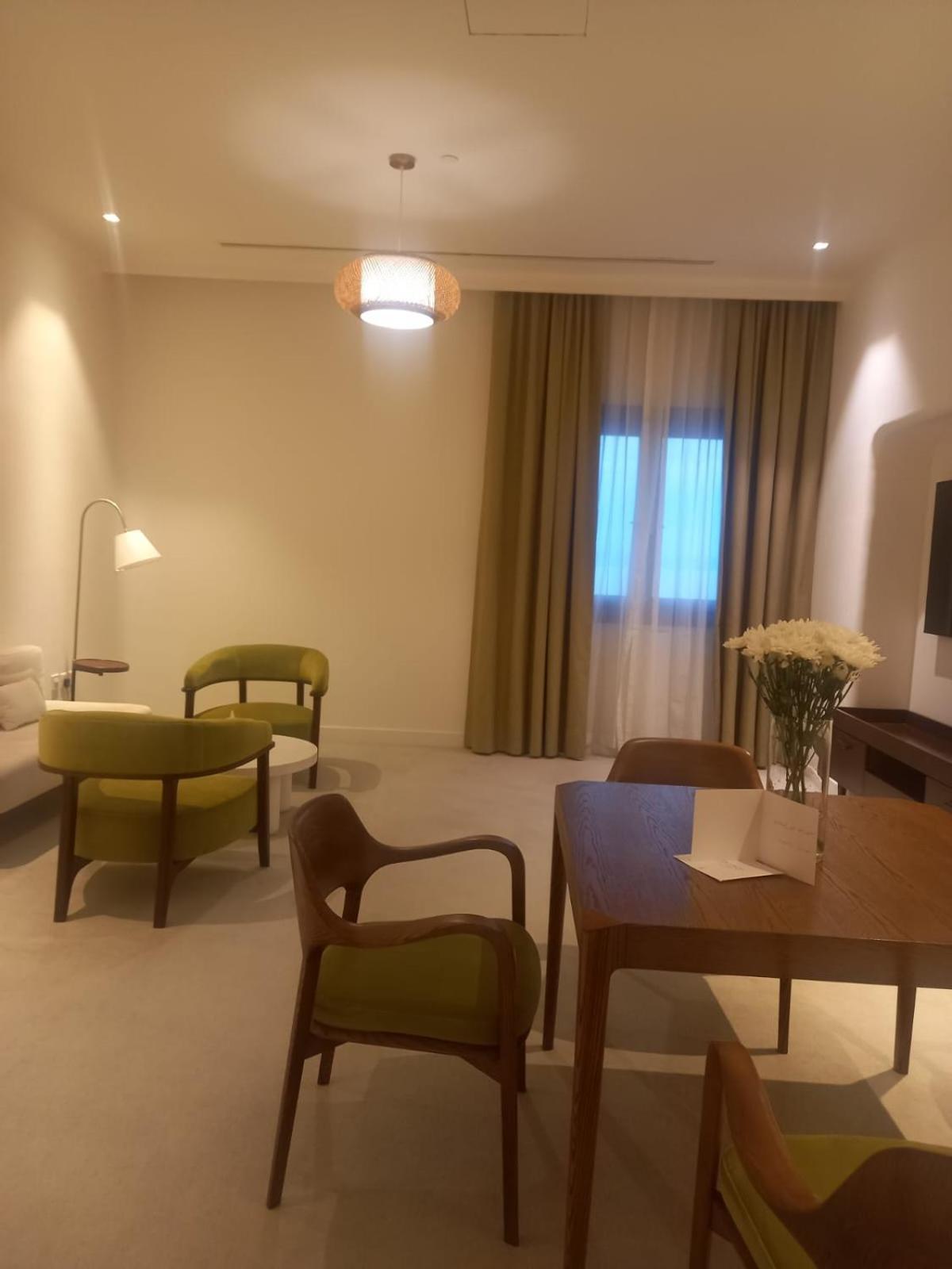 Mina Hotel And Residences By The Torch Doha Exterior foto A room at the hotel